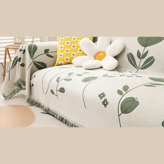 Sofabezug Chenille mit Blattmuster und Fransen in Creme-Grün